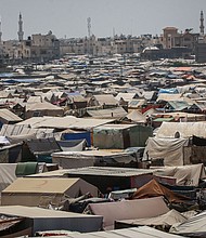 Seen here are tents erected at a temporary camp for displaced Palestinians in Rafah, southern Gaza, on May 3. Hamas says it has agreed to a ceasefire proposal from Egypt and Qatar.
Mandatory Credit:	Ahmad/Bloomberg/Getty Images via CNN Newsource