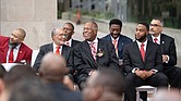 Members of the Kappa Alpha Psi Fraternity witness the unveiling of a monument honoring the Eta Xi chapter’s founding at Virginia Commonwealth University 50 years ago.