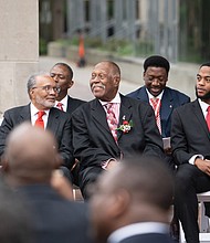 Members of the Kappa Alpha Psi Fraternity witness the unveiling of a monument honoring the Eta Xi chapter’s founding at Virginia Commonwealth University 50 years ago.
