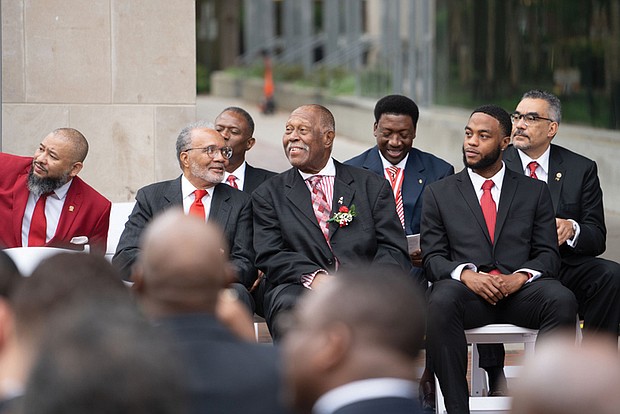 Members of the Kappa Alpha Psi Fraternity witness the unveiling of a monument honoring the Eta Xi chapter’s founding at Virginia Commonwealth University 50 years ago.