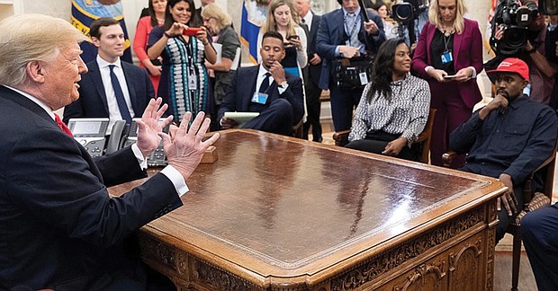 Donald Trump and rapper Kanye West meet in the White House in October 2018.