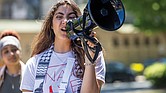 Sereen Haddad, a second-year student at Virginia Commonwealth University (VCU), addresses a crowd during a protest on Thursday, May 2, outside VCU’s James Branch Cabell Library. She and others shared recollections regarding events on Monday, April 29, when VCU deployed police at a pro-Palestinian protest.