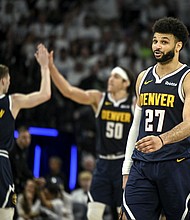 Jamal Murray's buzzer-beater capped an impressive first half.
Mandatory Credit:	AAron Ontiveroz/Denver Post/Getty Images via CNN Newsource
