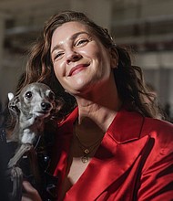Drew Barrymore holds dog influencer Tika the Iggy during an interview in 2022. Barrymore adores animals. She said she wept the most writing her memoir “Wildflower” when she shared a story about her beloved dog, Flossie, who lived to be almost 17.
Mandatory Credit:	Bebeto Matthews/AP via CNN Newsource