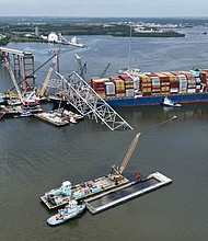 Salvage crews work to remove wreckage from the Dali on May 8, six weeks after the cargo ship collided with the Francis Scott Key Bridge in Baltimore, Maryland.
Mandatory Credit:	Chip Somodevilla/Getty Images via CNN Newsource