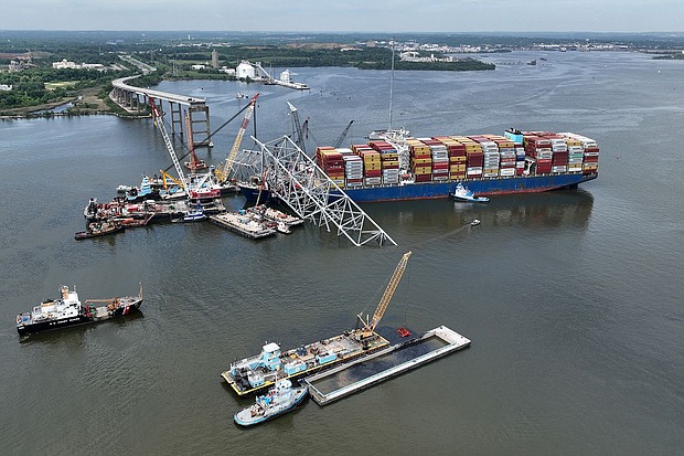 Salvage crews work to remove wreckage from the Dali on May 8, six weeks after the cargo ship collided with the Francis Scott Key Bridge in Baltimore, Maryland.
Mandatory Credit:	Chip Somodevilla/Getty Images via CNN Newsource