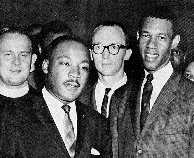 Rev. Dr. Martin Luther King, Jr. with Rev. William A. Lawson, and others looking on