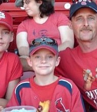 The Smalleys with their son Ty, who took his own life due to bullying