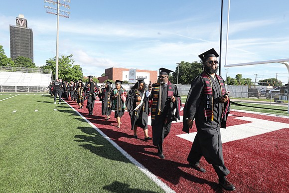 Virginia Union University’s undergraduates walk in and later turn their tassels symbolizing their transition from candidate to graduate during the …
