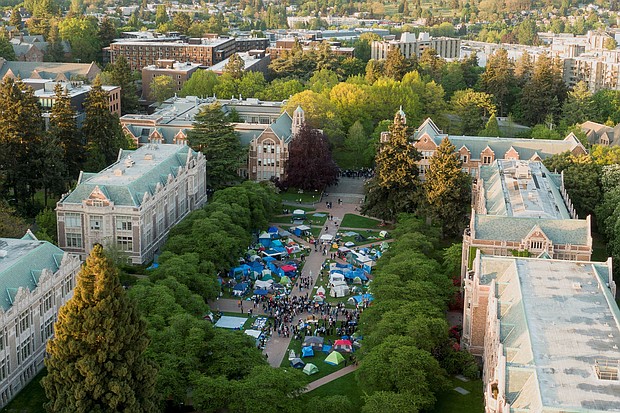 Demonstrators rally May 7 at a protest encampment at the University of Washington in Seattle in support of Palestinians in Gaza.
Mandatory Credit:	David Ryder/Reuters via CNN Newsource