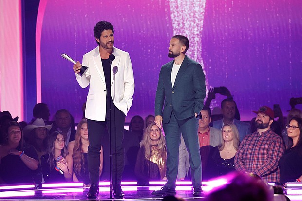 (From left) Dan Smyers and Shay Mooney of Dan + Shay at the 2024 ACM Awards in Texas.
Mandatory Credit:	Jason Kempin/Getty Images via CNN Newsource