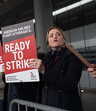 American Airlines flight attendants picket outside O’Hare International Airport to demand higher wages on May 9 in Chicago, Illinois. America's cost of living crisis has stung new flight attendants.
Mandatory Credit:	Scott Olson/Getty Images via CNN Newsource