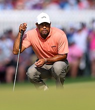 Woods endured a disappointing end to an otherwise promising round.
Mandatory Credit:	Christian Petersen/Getty Images via CNN Newsource