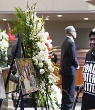 Mourners pay their respects for The Rev. William “Bill” Lawson in the sanctuary of the original Wheeler Avenue Baptist Church on Thursday, May 23, 2024 in Houston. Known for being a “Houston’s Pastor,” Lawson was the founding pastor of Wheeler Avenue Baptist Church who helped lead the Houston’s racial desegregation in the 1960s and continued to be a civil rights leader and spiritual guide throughout his life. He retired from the pulpit in 2004, but remained active in the church until his death on May 14 at age 95.