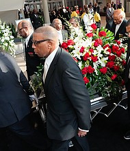 Pallbearers guide the casket of Rev. William “Bill” Lawson into sanctuary of the original Wheeler Avenue Baptist Church for a community celebration on Thursday, May 23, 2024, in Houston. Known for being a “Houston’s Pastor,” Lawson was the founding pastor of Wheeler Avenue Baptist Church who helped lead the Houston’s racial desegregation in the 1960s and continued to be a civil rights leader and spiritual guide throughout his life. He retired from the pulpit in 2004, but remained active in the church until his death on May 14 at age 95.