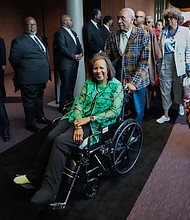Melanie I. Green, daughter of Rev. William “Bill” Lawson, enters the sanctuary at Wheeler Avenue Baptist Church for a community celebration in honor of her father on Thursday, May 23, 2024, in Houston. Known for being a “Houston’s Pastor,” Lawson was the founding pastor of Wheeler Avenue Baptist Church who helped lead the Houston’s racial desegregation in the 1960s and continued to be a civil rights leader and spiritual guide throughout his life. He retired from the pulpit in 2004, but remained active in the church until his death on May 14 at age 95.