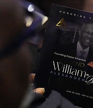 A program for a community celebration in honor of Rev. William “Bill” Lawson is seen at Wheeler Avenue Baptist Church on Thursday, May 23, 2024, in Houston. Known for being a “Houston’s Pastor,” Lawson was the founding pastor of Wheeler Avenue Baptist Church who helped lead the Houston’s racial desegregation in the 1960s and continued to be a civil rights leader and spiritual guide throughout his life. He retired from the pulpit in 2004, but remained active in the church until his death on May 14 at age 95.
