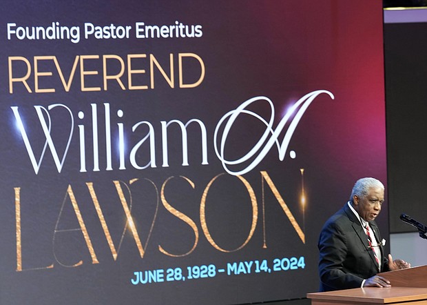 Judge Kenneth Hoyt speaks during a community celebration in honor of Rev. William “Bill” Lawson at Wheeler Avenue Baptist Church on Thursday, May 23, 2024, in Houston. Known for being a “Houston’s Pastor,” Lawson was the founding pastor of Wheeler Avenue Baptist Church who helped lead the Houston’s racial desegregation in the 1960s and continued to be a civil rights leader and spiritual guide throughout his life. He retired from the pulpit in 2004, but remained active in the church until his death on May 14 at age 95.