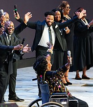 Singers read to Barbara Johnson Tucker on stage during a community celebration in honor of Rev. William “Bill” Lawson at Wheeler Avenue Baptist Church on Thursday, May 23, 2024, in Houston. Known for being a “Houston’s Pastor,” Lawson was the founding pastor of Wheeler Avenue Baptist Church who helped lead the Houston’s racial desegregation in the 1960s and continued to be a civil rights leader and spiritual guide throughout his life. He retired from the pulpit in 2004, but remained active in the church until his death on May 14 at age 95.