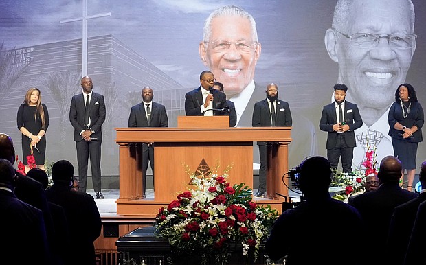 Pastor Marcus Cosby, center, speaks during a community celebration in honor of Rev. William “Bill” Lawson at Wheeler Avenue Baptist Church on Thursday, May 23, 2024, in Houston. Known for being a “Houston’s Pastor,” Lawson was the founding pastor of Wheeler Avenue Baptist Church who helped lead the Houston’s racial desegregation in the 1960s and continued to be a civil rights leader and spiritual guide throughout his life. He retired from the pulpit in 2004, but remained active in the church until his death on May 14 at age 95.