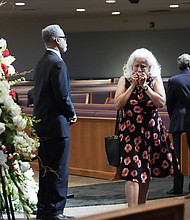 Mourners pay their respects for The Rev. William “Bill” Lawson in the sanctuary of the original Wheeler Avenue Baptist Church on Thursday, May 23, 2024 in Houston. Known for being a “Houston’s Pastor,” Lawson was the founding pastor of Wheeler Avenue Baptist Church who helped lead the Houston’s racial desegregation in the 1960s and continued to be a civil rights leader and spiritual guide throughout his life. He retired from the pulpit in 2004, but remained active in the church until his death on May 14 at age 95.