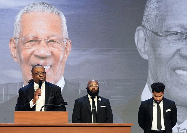 Pastor Marcus Cosby, left, speaks during a community celebration in honor of Rev. William “Bill” Lawson at Wheeler Avenue Baptist Church on Thursday, May 23, 2024, in Houston. Known for being a “Houston’s Pastor,” Lawson was the founding pastor of Wheeler Avenue Baptist Church who helped lead the Houston’s racial desegregation in the 1960s and continued to be a civil rights leader and spiritual guide throughout his life. He retired from the pulpit in 2004, but remained active in the church until his death on May 14 at age 95.