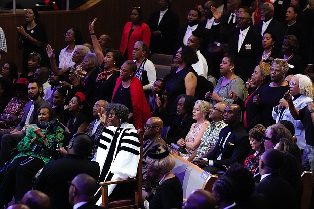 People react during a community celebration in honor of Rev. William “Bill” Lawson at Wheeler Avenue Baptist Church on Thursday, May 23, 2024, in Houston. Known for being a “Houston’s Pastor,” Lawson was the founding pastor of Wheeler Avenue Baptist Church who helped lead the Houston’s racial desegregation in the 1960s and continued to be a civil rights leader and spiritual guide throughout his life. He retired from the pulpit in 2004, but remained active in the church until his death on May 14 at age 95.