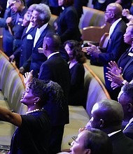 People react during a community celebration in honor of Rev. William “Bill” Lawson at Wheeler Avenue Baptist Church on Thursday, May 23, 2024, in Houston. Known for being a “Houston’s Pastor,” Lawson was the founding pastor of Wheeler Avenue Baptist Church who helped lead the Houston’s racial desegregation in the 1960s and continued to be a civil rights leader and spiritual guide throughout his life. He retired from the pulpit in 2004, but remained active in the church until his death on May 14 at age 95.