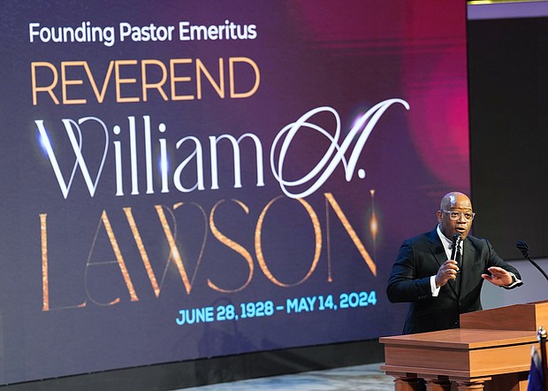 Dr. Timothy Sloan, pastor of The Luke Church, speaks during a community celebration in honor of Rev. William “Bill” Lawson at Wheeler Avenue Baptist Church on Thursday, May 23, 2024, in Houston.