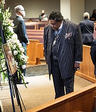 Mourners pay their respects for The Rev. William “Bill” Lawson in the sanctuary of the original Wheeler Avenue Baptist Church on Thursday, May 23, 2024 in Houston. Known for being a “Houston’s Pastor,” Lawson was the founding pastor of Wheeler Avenue Baptist Church who helped lead the Houston’s racial desegregation in the 1960s and continued to be a civil rights leader and spiritual guide throughout his life. He retired from the pulpit in 2004, but remained active in the church until his death on May 14 at age 95.
