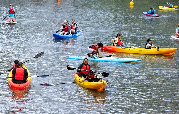 Appomattox River Company and Waterfront RVA recreational kayaks provide for festival-goers to paddle around in the canal and Tredegar Boat Ramp.