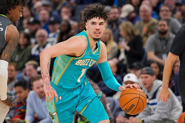 Ball dribbles against the Minnesota Timberwolves in the fourth quarter at Target Center. A mother is suing LaMelo Ball and his team, the Charlotte Hornets, after the 22-year-old NBA star allegedly hit her son with his car.
Mandatory Credit:	Brad Rempel/USA Today Sports/Reuters via CNN Newsource