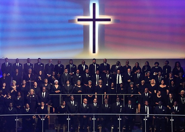 Choir members stand during a community celebration in honor of Rev. William “Bill” Lawson at Wheeler Avenue Baptist Church on Thursday, May 23, 2024, in Houston. Known for being a “Houston’s Pastor,” Lawson was the founding pastor of Wheeler Avenue Baptist Church who helped lead the Houston’s racial desegregation in the 1960s and continued to be a civil rights leader and spiritual guide throughout his life. He retired from the pulpit in 2004, but remained active in the church until his death on May 14 at age 95.