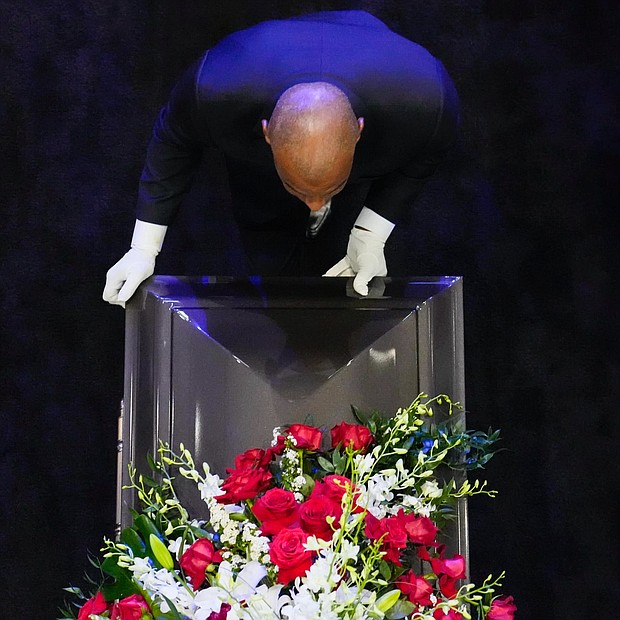 The casket of Rev. William “Bill” Lawson is taken from the sanctuary at Wheeler Avenue Baptist Church after his community celebration on Thursday, May 23, 2024, in Houston.