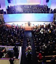 The casket of Rev. William “Bill” Lawson is taken from the sanctuary at Wheeler Avenue Baptist Church after his community celebration on Thursday, May 23, 2024, in Houston.