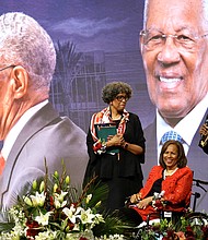 Rev. William “Bill” Lawson’s daughters Cheryl Lawson, left, Melanie Lawson, Roxanne Lawson speak about their father during a celebration in honor of Rev. William “Bill” Lawson at Wheeler Avenue Baptist Church on Friday, May 24, 2024, in Houston. Known for being a “Houston’s Pastor,” Lawson was the founding pastor of Wheeler Avenue Baptist Church who helped lead the Houston’s racial desegregation in the 1960s and continued to be a civil rights leader and spiritual guide throughout his life. He retired from the pulpit in 2004, but remained active in the church until his death on May 14 at age 95.