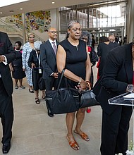 Mourners line up to sign the condolence book as they arrive for the celebration of life services for The Rev. William “Bill” Lawson at Wheeler Avenue Baptist Church on Friday, May 24, 2024 in Houston. Known for being a “Houston’s Pastor,” Lawson was the founding pastor of Wheeler Avenue Baptist Church who helped lead the Houston’s racial desegregation in the 1960s and continued to be a civil rights leader and spiritual guide throughout his life. He retired from the pulpit in 2004, but remained active in the church until his death on May 14 at age 95.