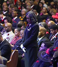 Mourners bow their heads in prayer during the celebration of life services for The Rev. William “Bill” Lawson at Wheeler Avenue Baptist Church on Friday, May 24, 2024 in Houston. Known for being a “Houston’s Pastor,” Lawson was the founding pastor of Wheeler Avenue Baptist Church who helped lead the Houston’s racial desegregation in the 1960s and continued to be a civil rights leader and spiritual guide throughout his life. He retired from the pulpit in 2004, but remained active in the church until his death on May 14 at age 95.