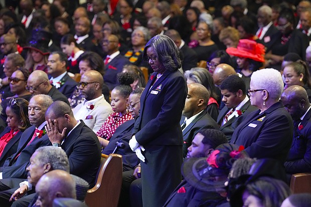 Mourners bow their heads in prayer during the celebration of life services for The Rev. William “Bill” Lawson at Wheeler Avenue Baptist Church on Friday, May 24, 2024 in Houston. Known for being a “Houston’s Pastor,” Lawson was the founding pastor of Wheeler Avenue Baptist Church who helped lead the Houston’s racial desegregation in the 1960s and continued to be a civil rights leader and spiritual guide throughout his life. He retired from the pulpit in 2004, but remained active in the church until his death on May 14 at age 95.