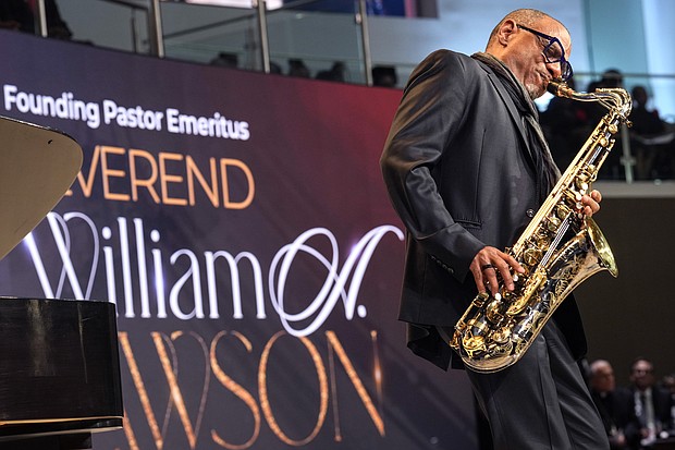 Kirk Whalum plays a song on the saxophone during the celebration of life for The Rev. William “Bill” Lawson on Friday, May 24, 2024 in Houston. Known for being a “Houston’s Pastor,” Lawson was the founding pastor of Wheeler Avenue Baptist Church who helped lead the Houston’s racial desegregation in the 1960s and continued to be a civil rights leader and spiritual guide throughout his life. He retired from the pulpit in 2004, but remained active in the church until his death on May 14 at age 95.