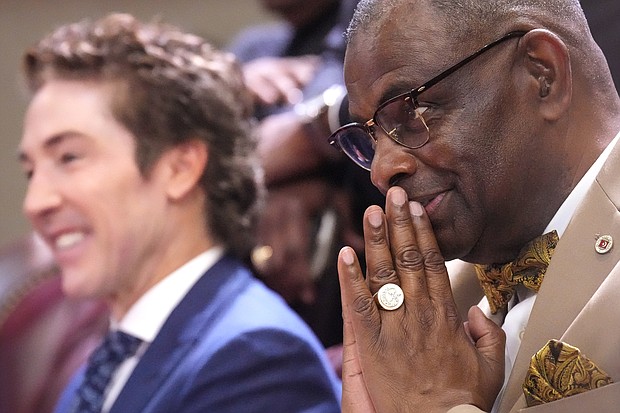 The Rev. Joel Osteen, left, and Dr. Abdul Haley Muhammad listen to tributes during the celebration of life services for The Rev. William “Bill” Lawson on Friday, May 24, 2024 in Houston. Known for being a “Houston’s Pastor,” Lawson was the founding pastor of Wheeler Avenue Baptist Church who helped lead the Houston’s racial desegregation in the 1960s and continued to be a civil rights leader and spiritual guide throughout his life. He retired from the pulpit in 2004, but remained active in the church until his death on May 14 at age 95.