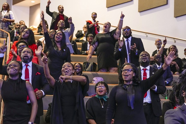 Church members react to a song during the celebration of life services for The Rev. William “Bill” Lawson in the sanctuary of the original Wheeler Avenue Baptist Church on Friday, May 24, 2024 in Houston. Known for being a “Houston’s Pastor,” Lawson was the founding pastor of Wheeler Avenue Baptist Church who helped lead the Houston’s racial desegregation in the 1960s and continued to be a civil rights leader and spiritual guide throughout his life. He retired from the pulpit in 2004, but remained active in the church until his death on May 14 at age 95.