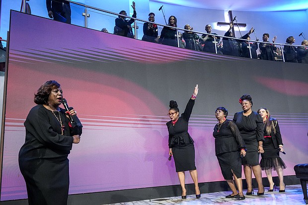 Bettye Armstrong leads the choir off the stage at the end of her performance during the celebration of life services for The Rev. William “Bill” Lawson on Friday, May 24, 2024 in Houston. Known for being a “Houston’s Pastor,” Lawson was the founding pastor of Wheeler Avenue Baptist Church who helped lead the Houston’s racial desegregation in the 1960s and continued to be a civil rights leader and spiritual guide throughout his life. He retired from the pulpit in 2004, but remained active in the church until his death on May 14 at age 95.