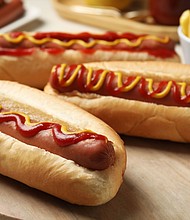 Hot dogs are an American favorite.
Mandatory Credit:	Liudmila Chernetska/iStockphoto/Getty Images via CNN Newsource