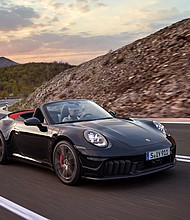 Porsche unveiled the first hybrid version of its most famous sports car, the 911, on May 28, a move that could help electric motors become more accepted even in performance cars.
Mandatory Credit:	Porsche via CNN Newsource