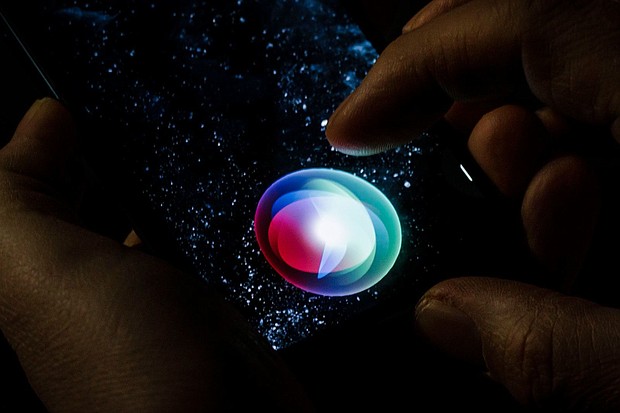 Siri is displayed on a smartphone.
Mandatory Credit:	Thomas Trutschel/Photothek/Getty Images/File via CNN Newsource