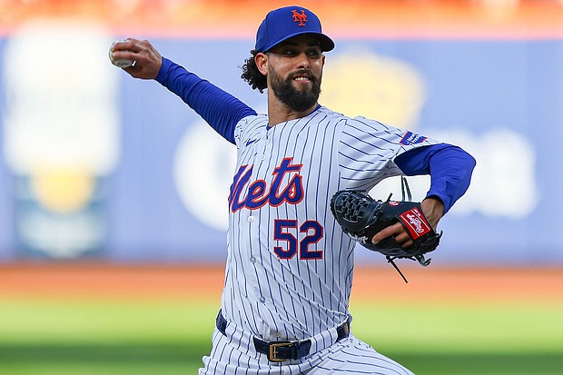Jorge López throws a pitch during the 10th inning of the New York Mets' game against the Los Angeles Dodgers on May 28. López threw his glove into the crowd following his ejection from a game against the Los Angeles Dodgers on Wednesday.
Mandatory Credit:	Gordon Donovan/NURPHO/AP via CNN Newsource