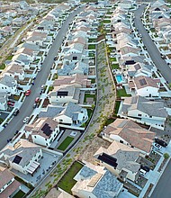 An aerial view of homes in a housing development in September 2023 in Santa Clarita, California. A new zero-percent down mortgage program was launched two weeks ago by one of the nation’s largest mortgage lenders.
Mandatory Credit:	Mario Tama/Getty Images via CNN Newsource