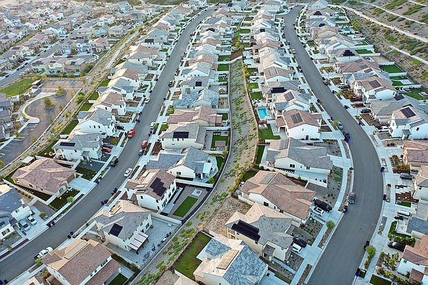 An aerial view of homes in a housing development in September 2023 in Santa Clarita, California. A new zero-percent down mortgage program was launched two weeks ago by one of the nation’s largest mortgage lenders.
Mandatory Credit:	Mario Tama/Getty Images via CNN Newsource