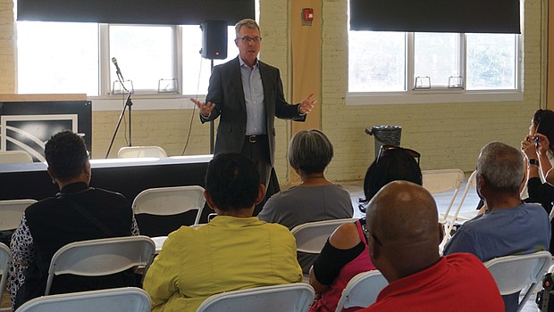 Virginia Union University Spokesperson Grant Neely addresses attendees of the Edgehill Chamberlayne Court Civic Association meeting on Tuesday.